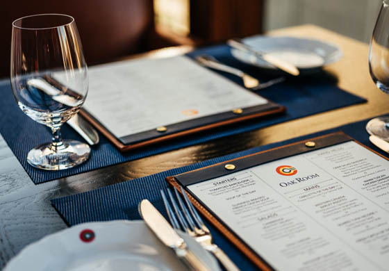 Menus in the Oak Room at the Cambridge Club