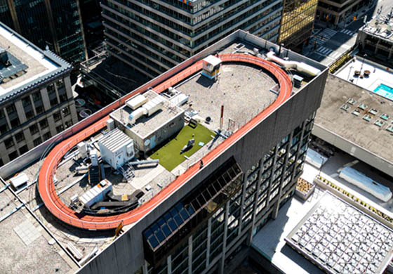 Drone footage of the rooftop track & workout space at the Cambridge Club