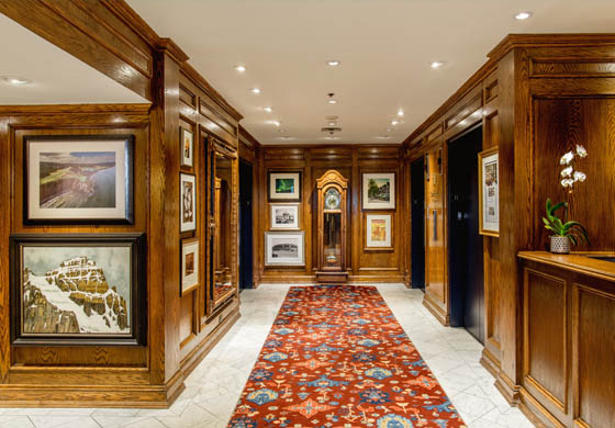 Lobby at the Cambridge Club, featuring the grandfather clock at the elevators