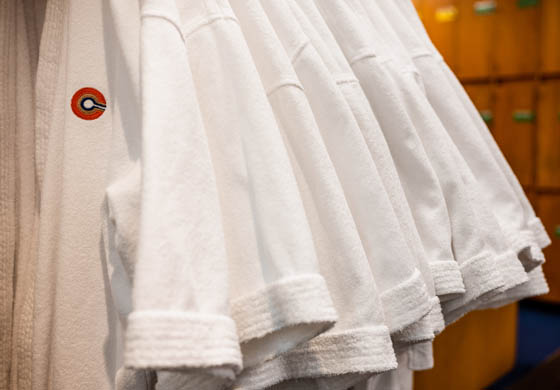 Cambridge Club robes hanging up in the locker room