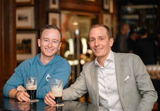 Tyler - our GM - enjoying a beer with another young member at the bar in the Oak Room